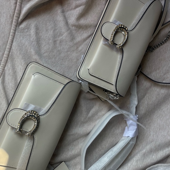 Coach Cream and Silver Clutch with Elegant Design
